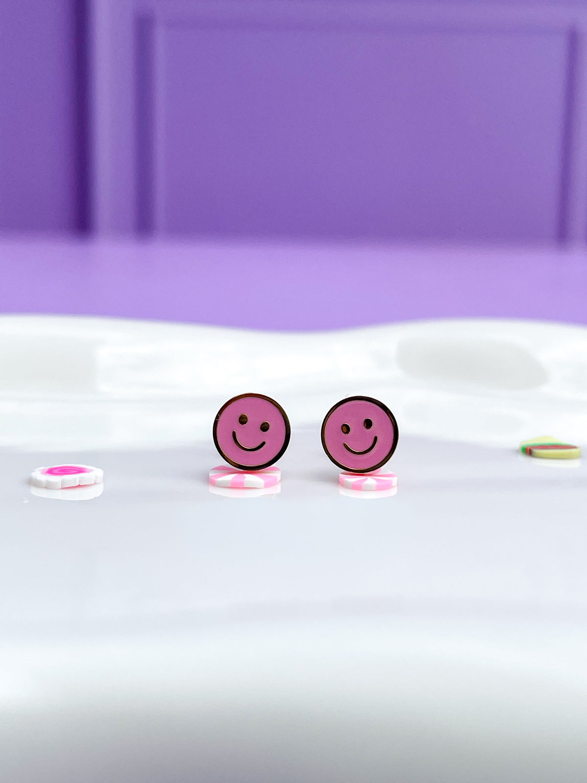 Aretes happy face pink