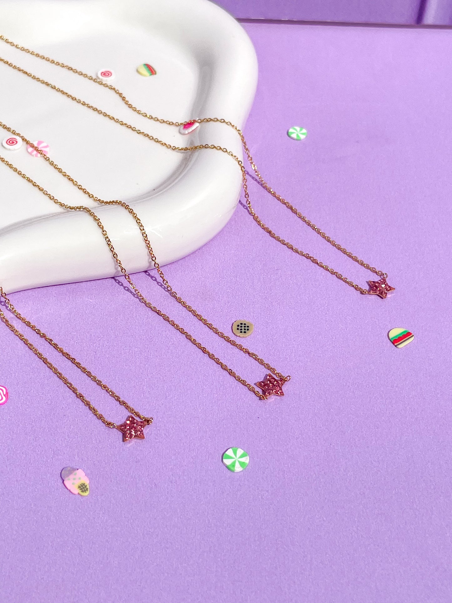 Collar dorado estrella rosa mini brillantes