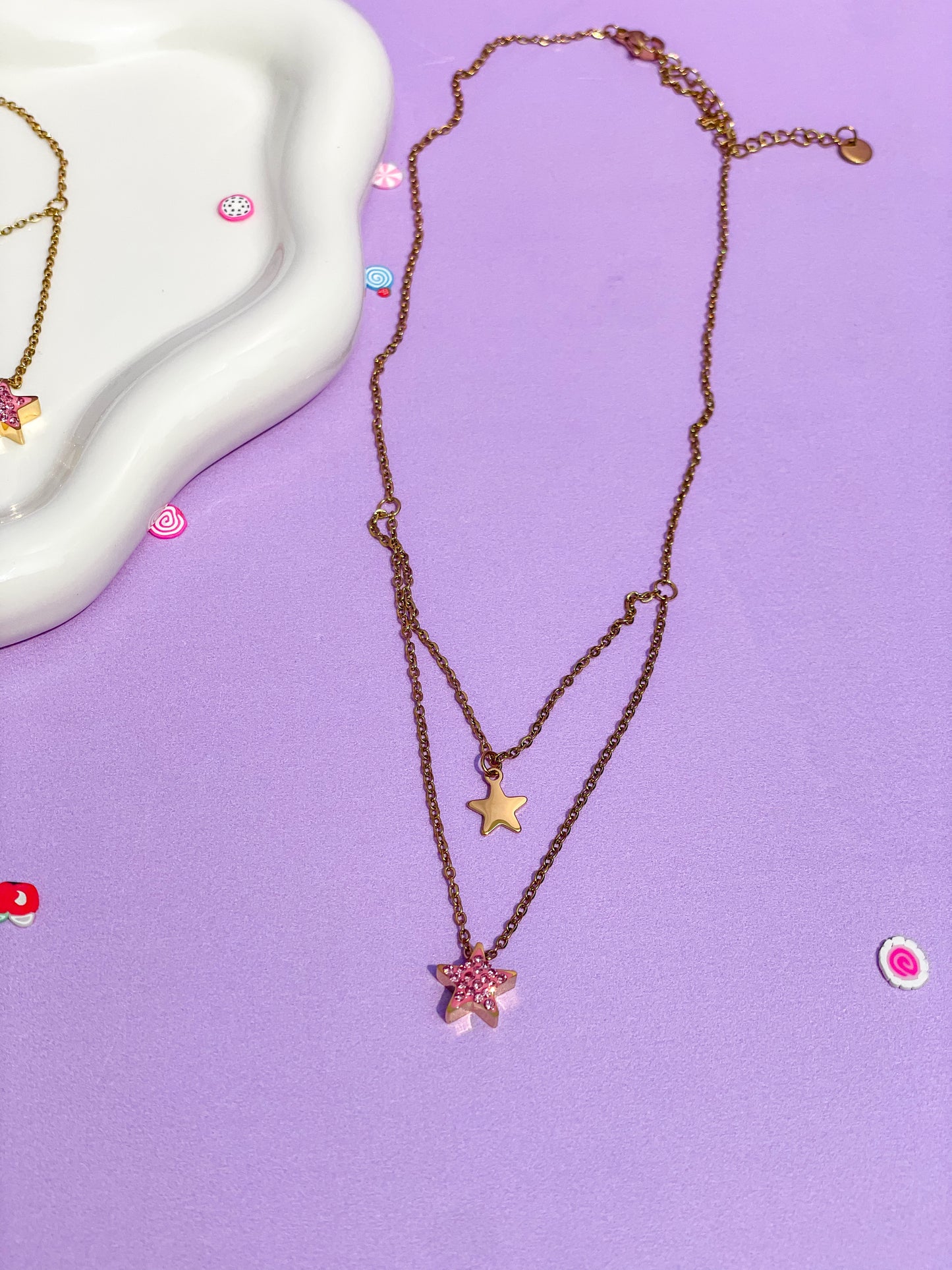 Collar doble estrella rosa brillante