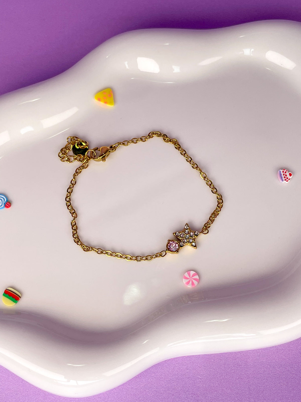 Pulsera estrella de brillantes con brillantina rosa