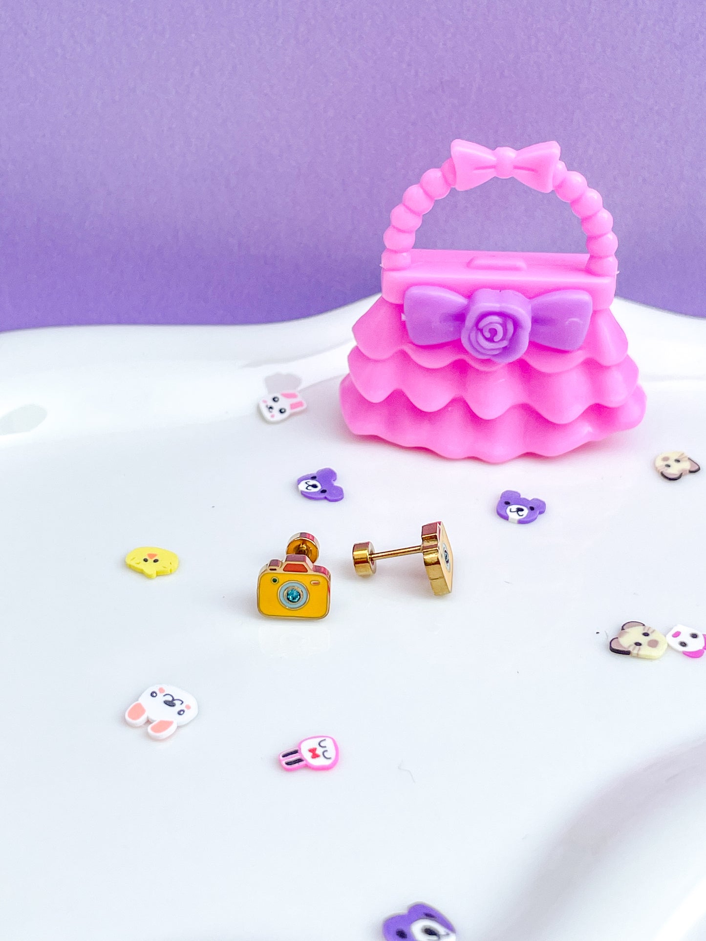 Aretes forma de cámara