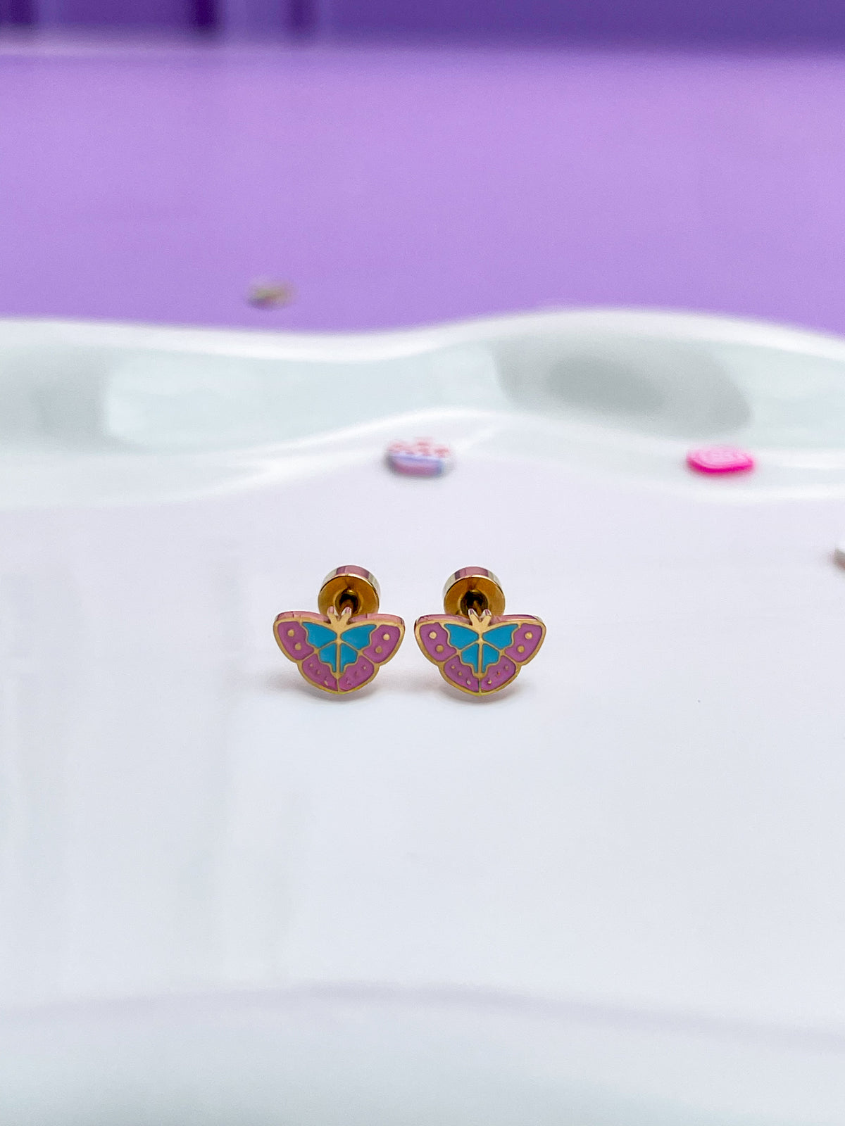 Aretes mariposa azul con rosa