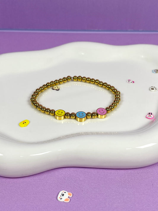 Pulsera elástico bolitas happy face