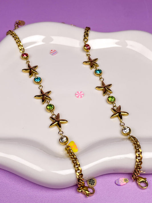 Pulsera dorada estrellas de mar con brillantinas