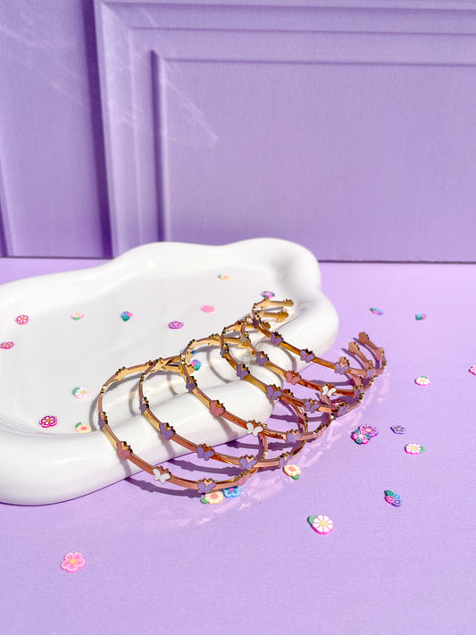 Pulsera rígida mariposa morada