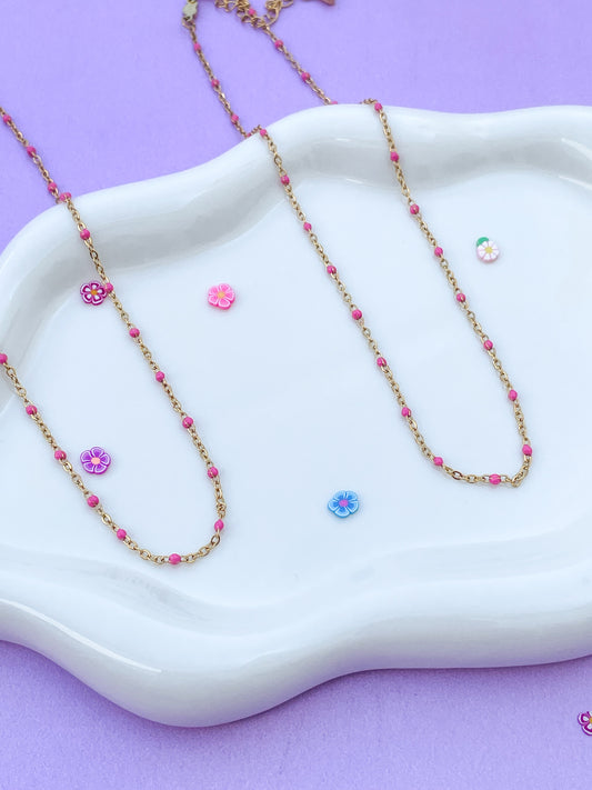 Collar bolitas rosas
