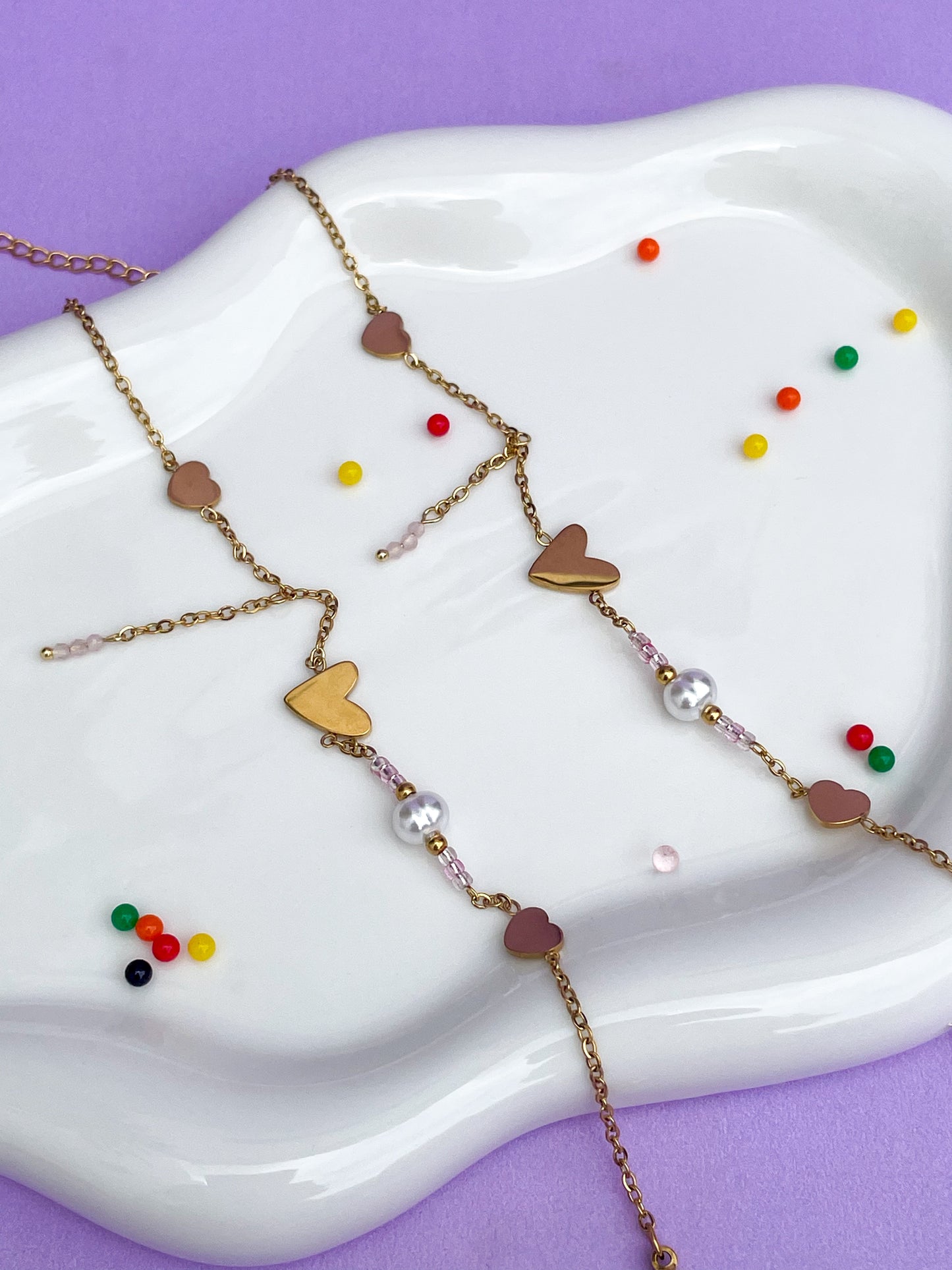 Pulsera corazones dorados