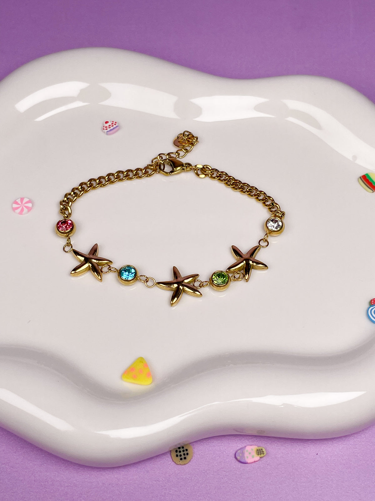 Pulsera dorada estrellas de mar con brillantinas