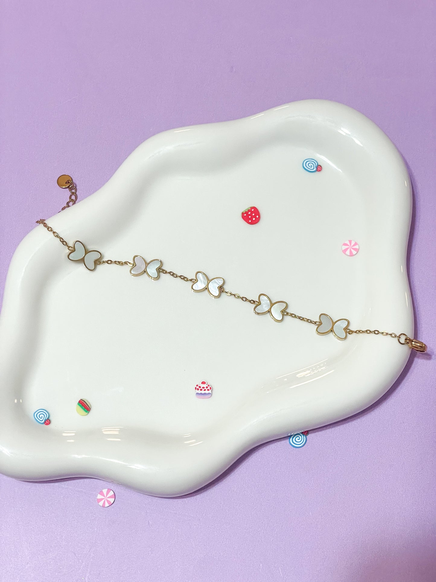 Pulsera mariposa perla blanca