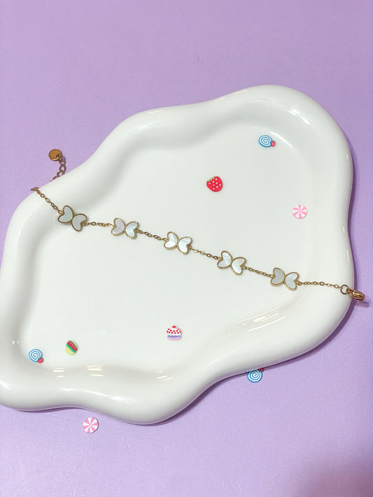 Pulsera mariposa perla blanca