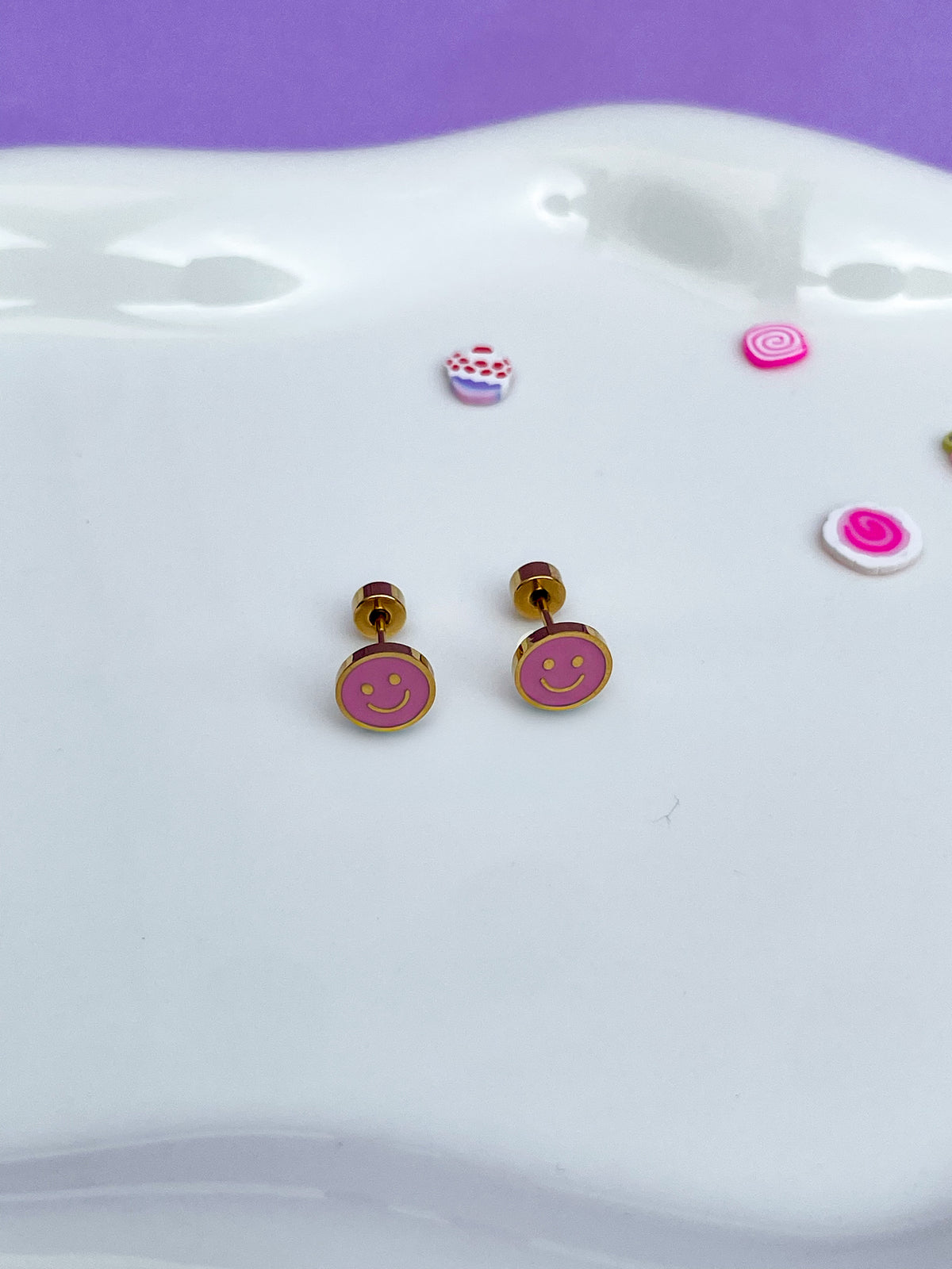 Aretes happy face pink