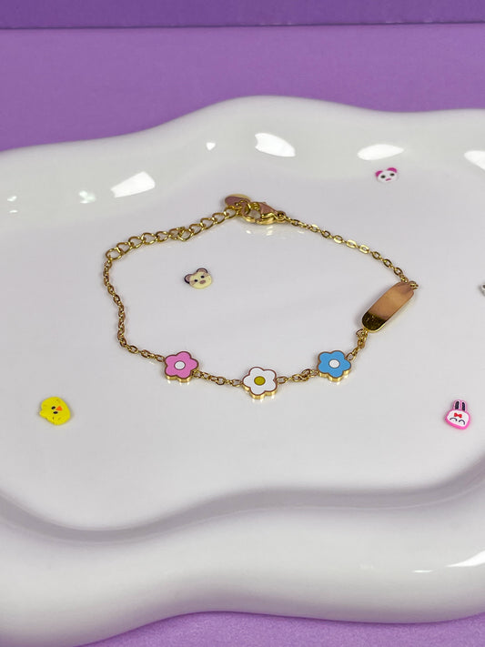 Pulsera flores colores y placa dorada