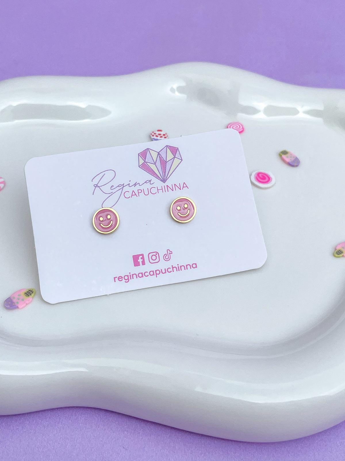 Aretes happy face pink