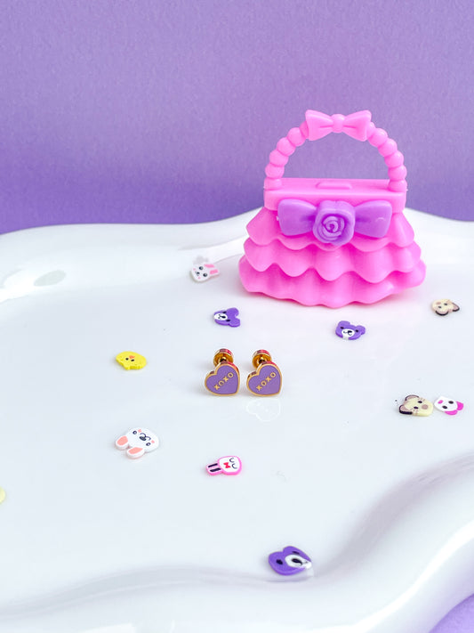Aretes corazón morado xoxo