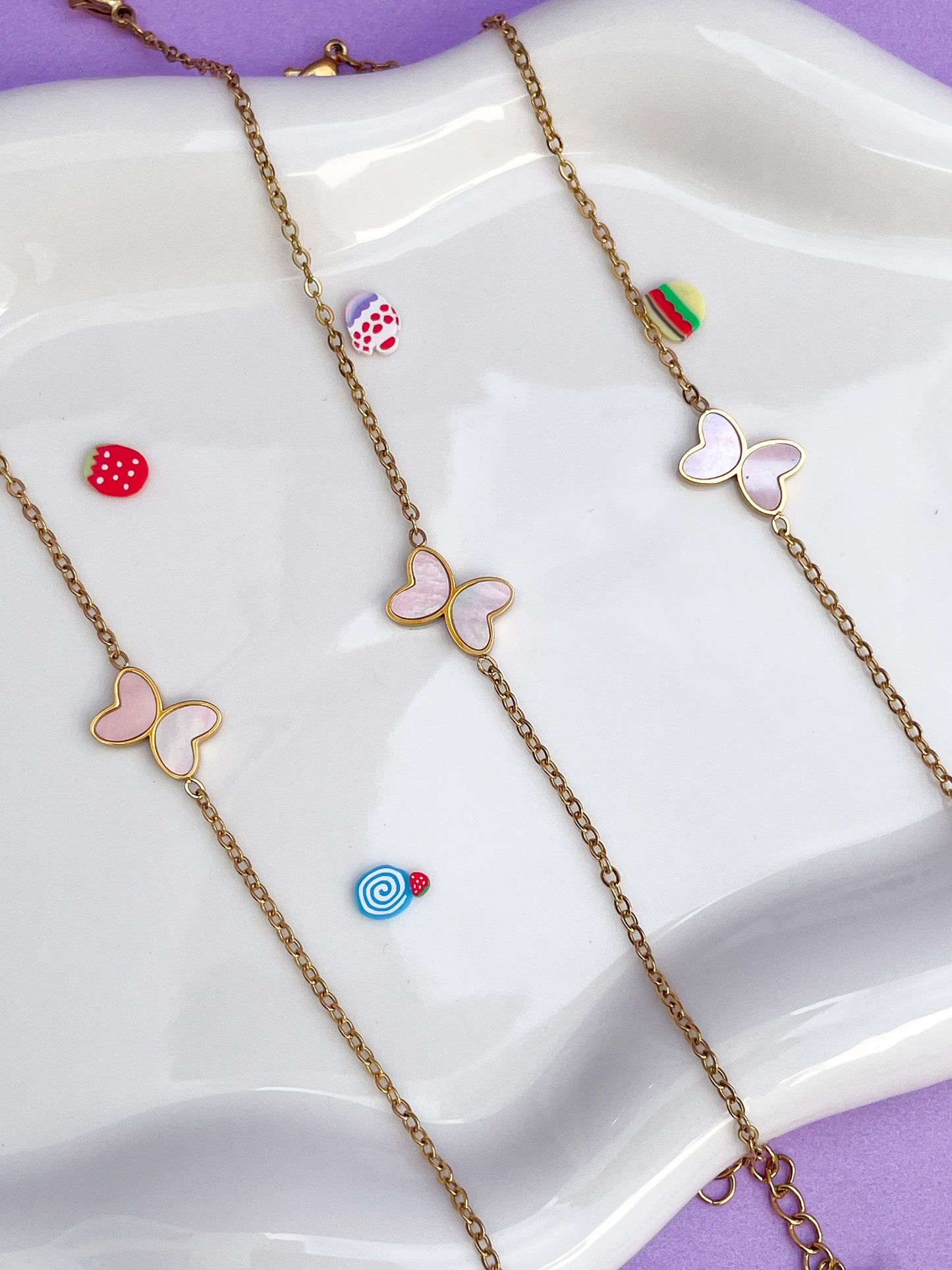 Pulsera mariposa sola perla rosa