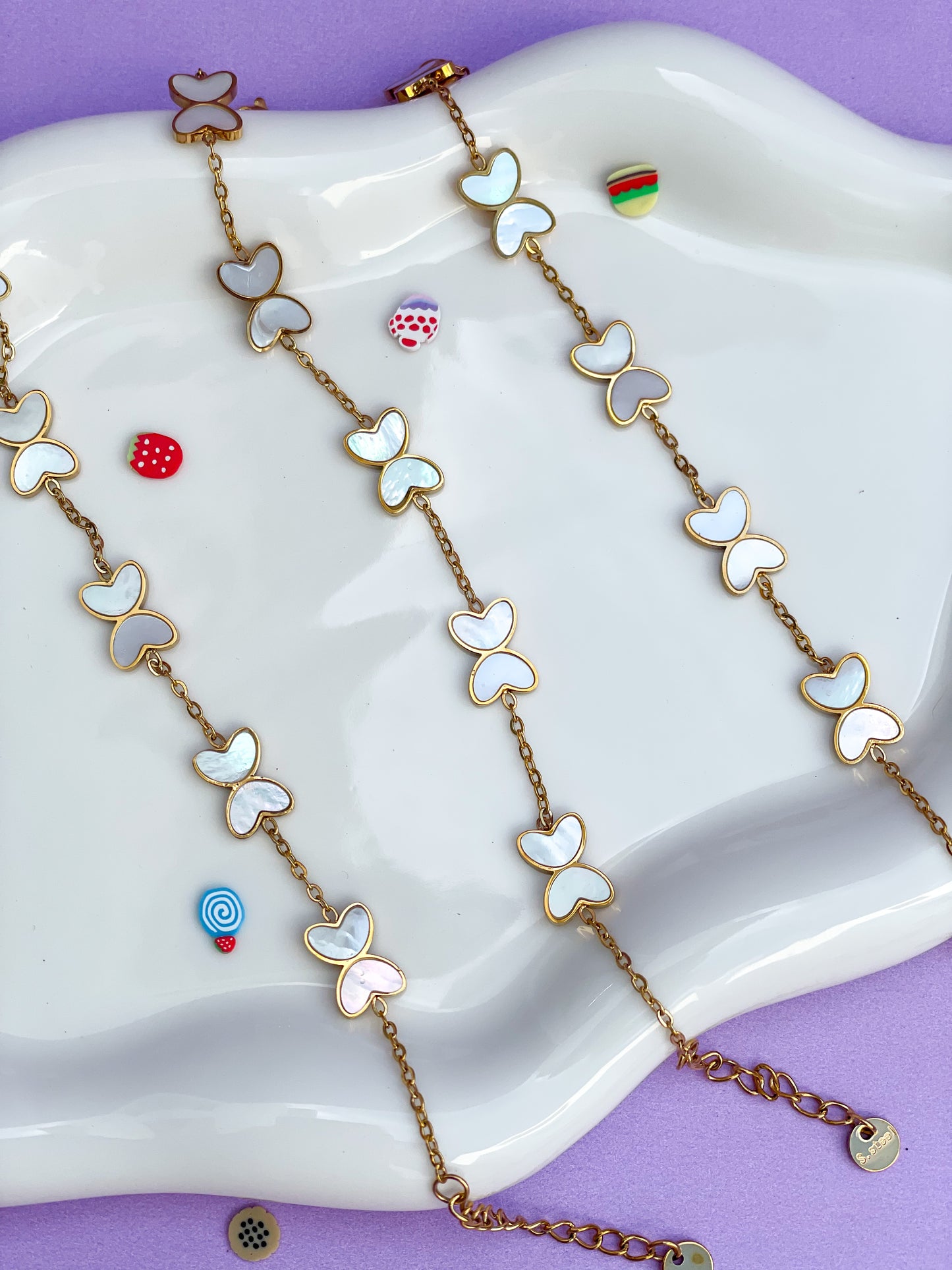 Pulsera mariposa perla blanca