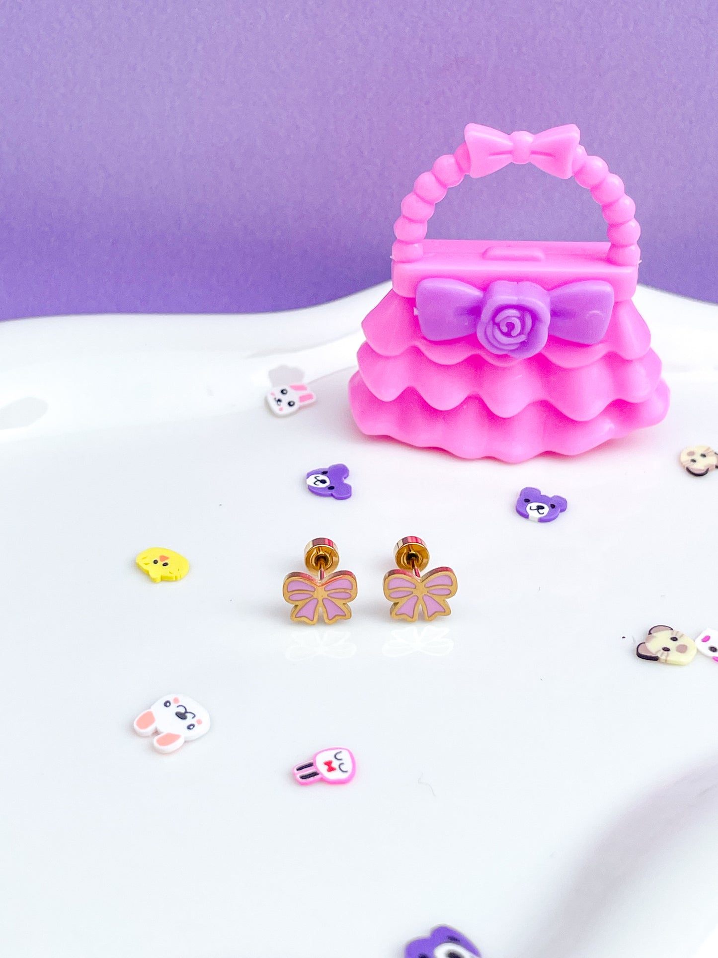 Aretes moño rosa