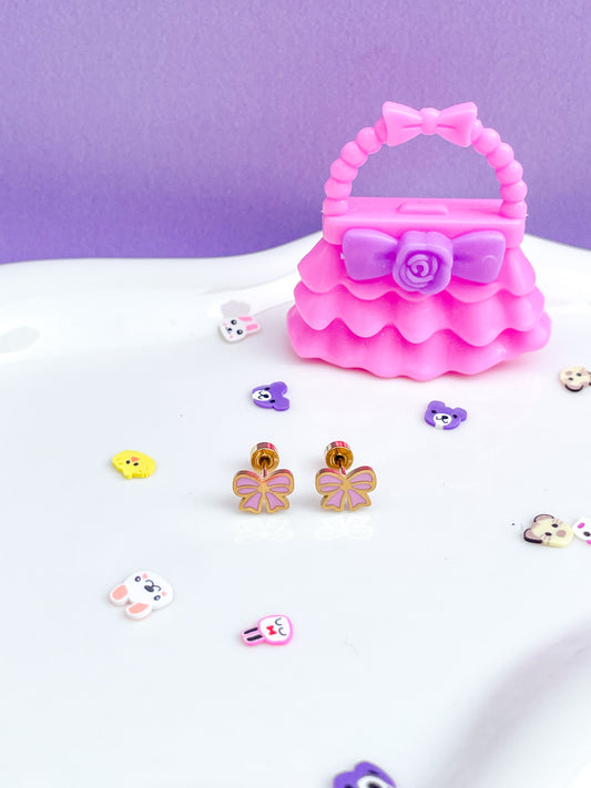 Aretes moño rosa