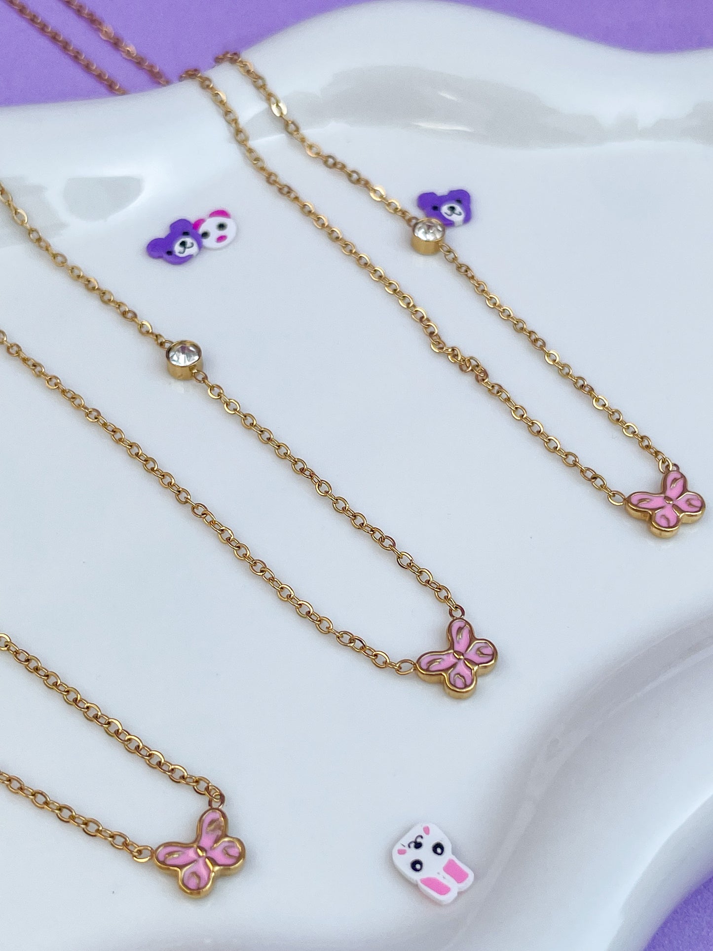 Collar mariposa rosa mini con brillante
