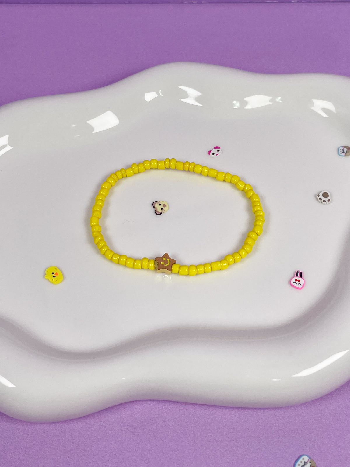 Pulsera elástico de bolitas yellow y estrellita