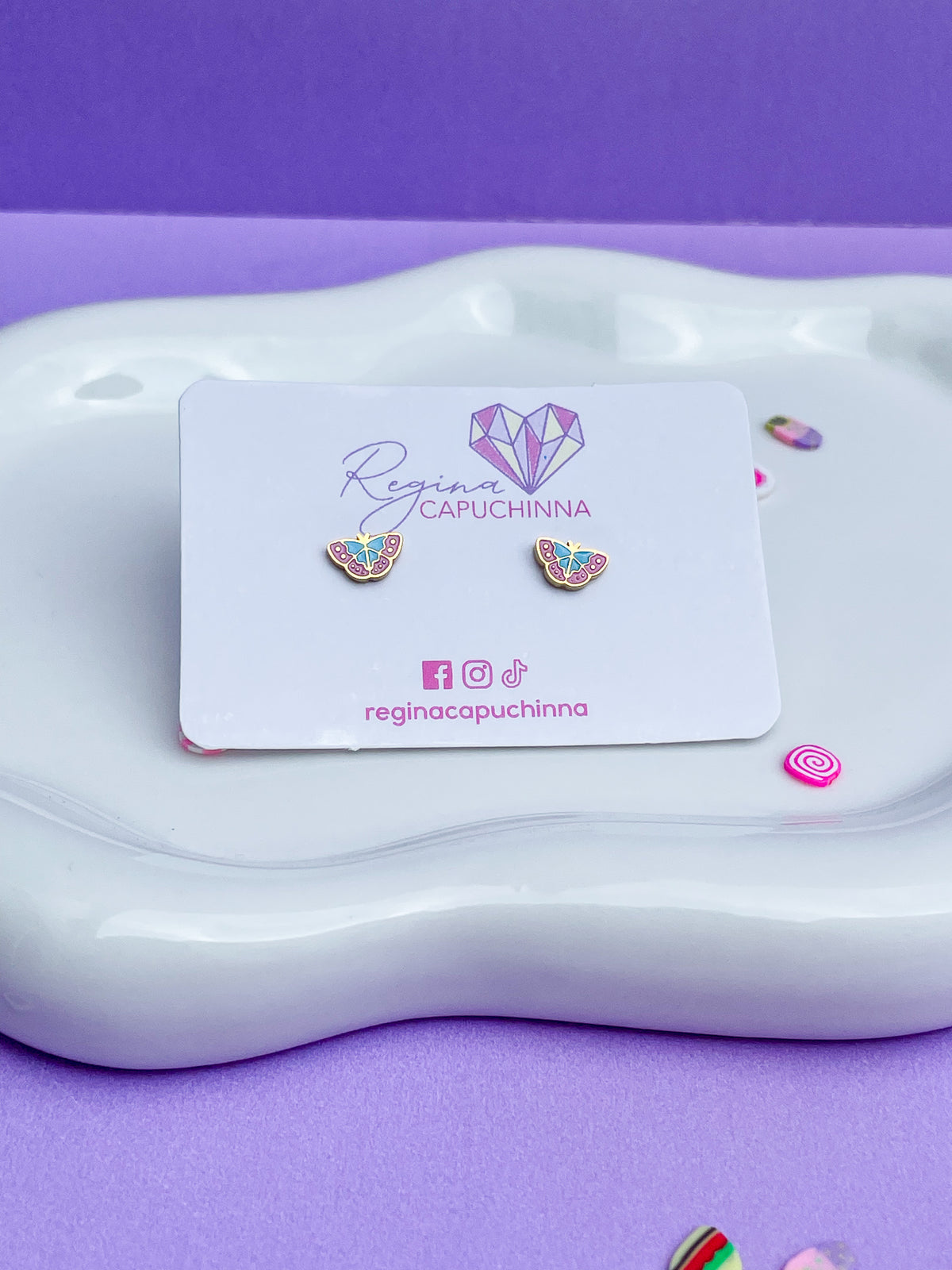 Aretes mariposa azul con rosa