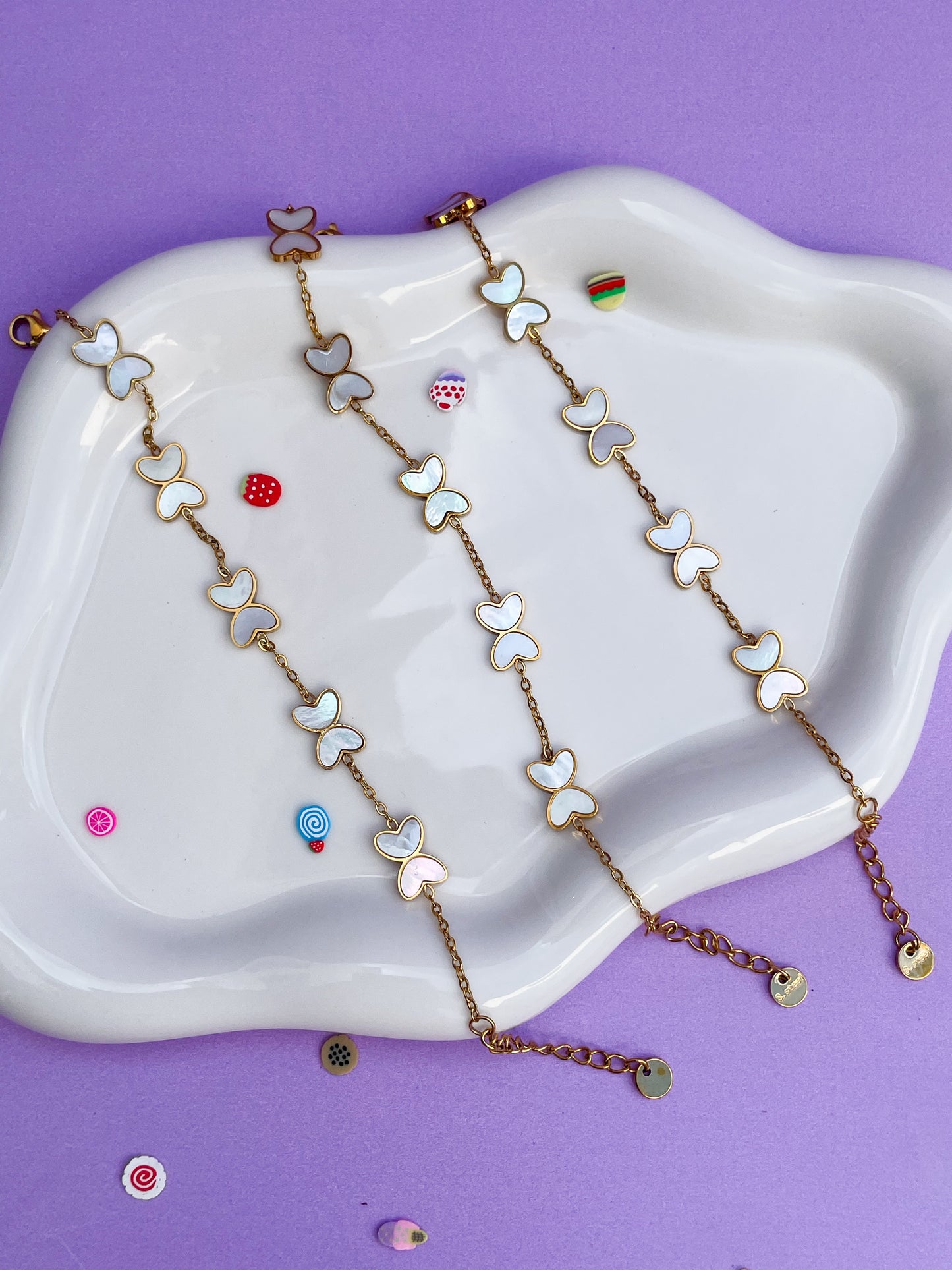 Pulsera mariposa perla blanca