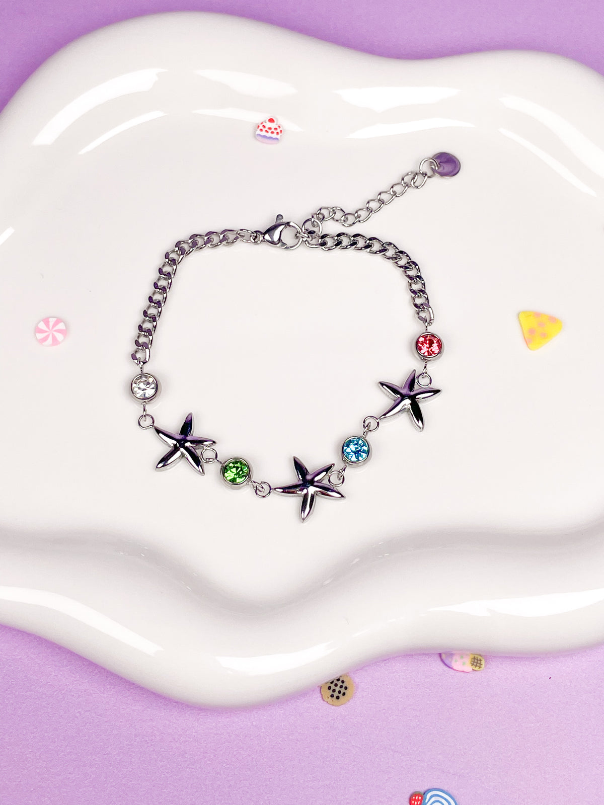Pulsera plateada estrellas de mar con brillantina