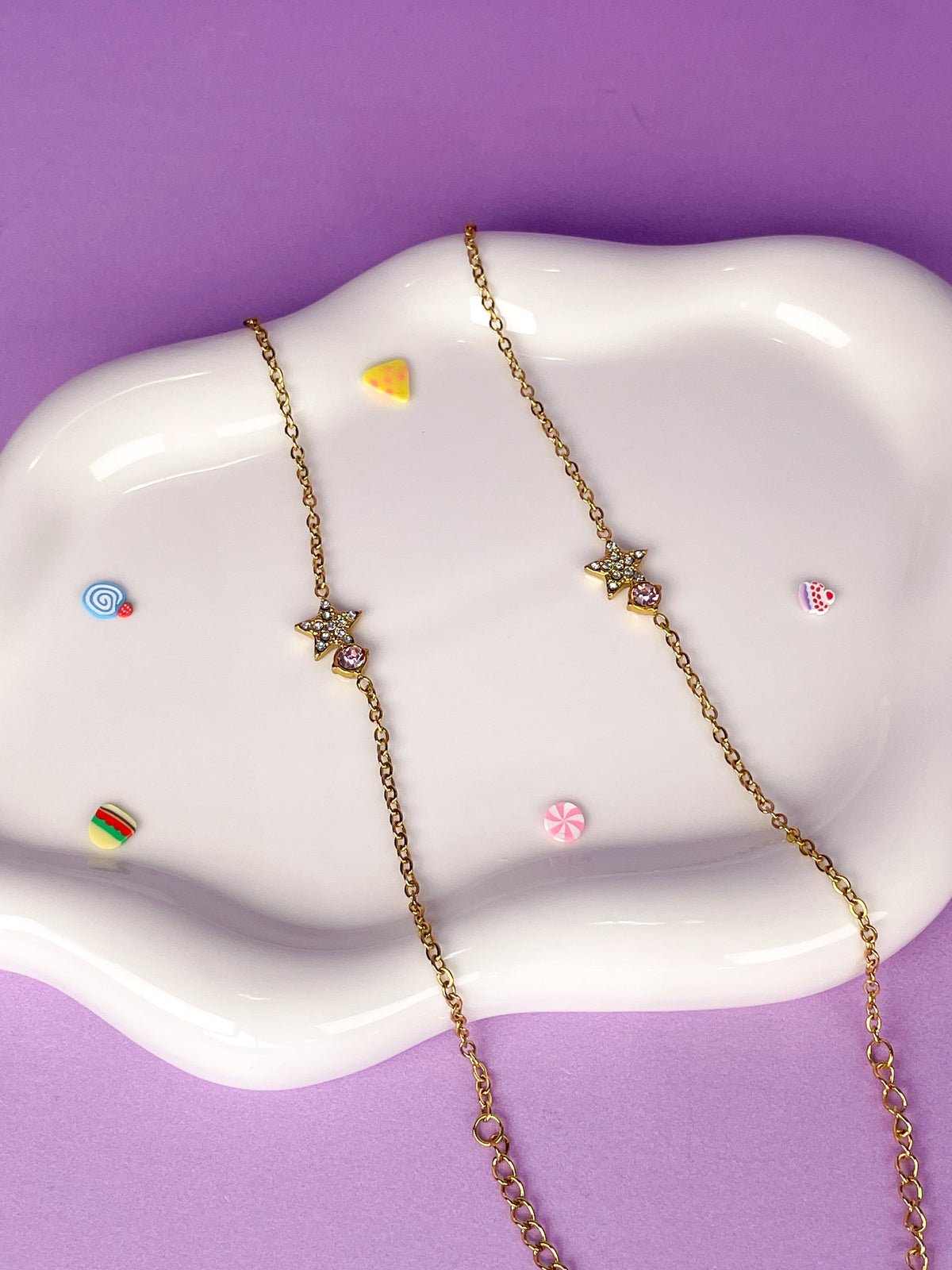 Pulsera estrella de brillantes con brillantina rosa